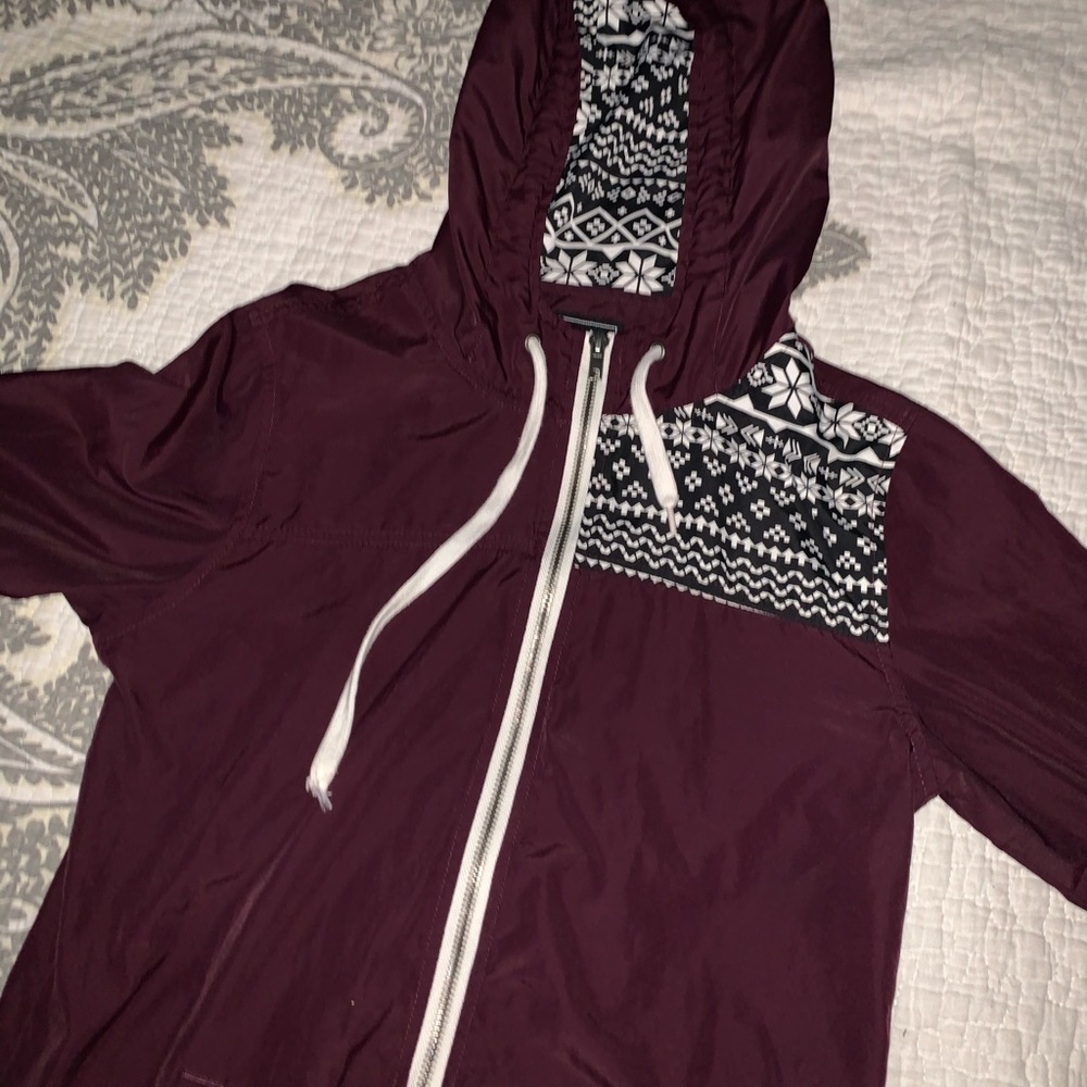 A Burgundy raincoat